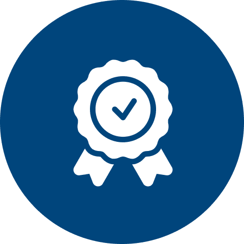 Group 1321315770 (4) Icon of a white, round badge with a check mark, and ribbon tails on a blue circular background.